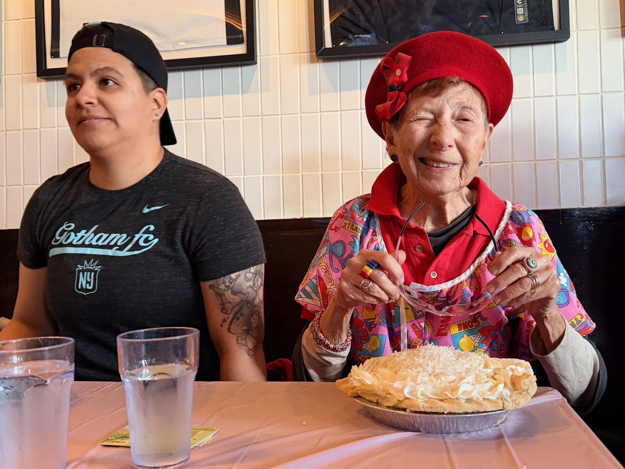 Competitor (Babs Daitch) winks at the camera as she prepares for the pie-eating contest.